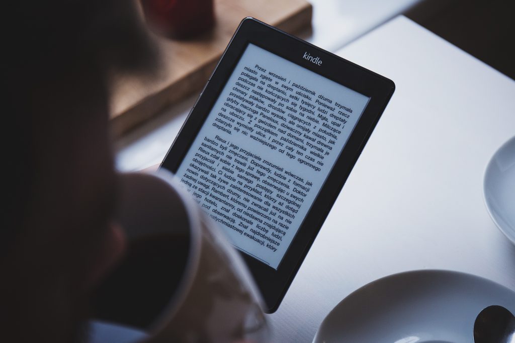 kindle and coffee cup